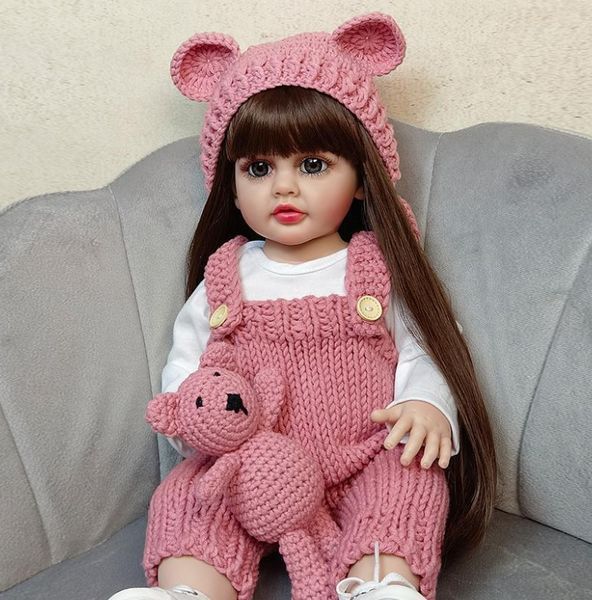 Ігрова лялька у стилі Reborn Baby Doll Adeline 55 см &ndash; вінілова з одягом та аксесуарами;підходить для купання (RB045) RB045 фото