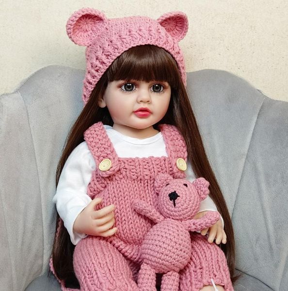 Ігрова лялька у стилі Reborn Baby Doll Adeline 55 см &ndash; вінілова з одягом та аксесуарами;підходить для купання (RB045) RB045 фото