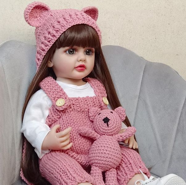 Ігрова лялька у стилі Reborn Baby Doll Adeline 55 см &ndash; вінілова з одягом та аксесуарами;підходить для купання (RB045) RB045 фото