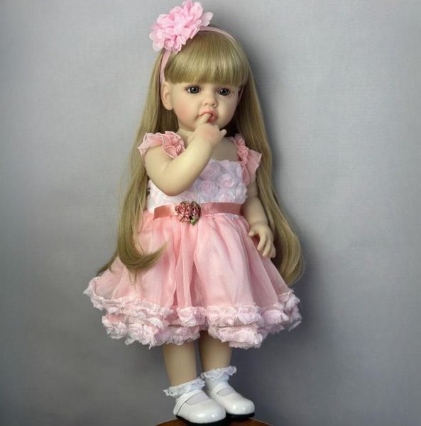 Ігрова лялька у стилі Reborn Baby Doll Bella 55 см &ndash; вінілова з одягом та аксесуарами;підходить для купання (RB051) RB051 фото