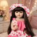 Ігрова лялька у стилі Reborn Baby Doll Milana 55 см &ndash; вінілова дівчинка з довгим темним волоссям та аксесуарами; підходить для купання (RB096) RB096 фото 1