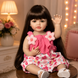 Ігрова лялька у стилі Reborn Baby Doll Milana 55 см &ndash; вінілова дівчинка з довгим темним волоссям та аксесуарами; підходить для купання (RB096) RB096 фото 2