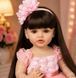 Ігрова лялька у стилі Reborn Baby Doll Rosalie 55 см &ndash; вінілова дівчинка з довгим темним волоссям та аксесуарами; підходить для купання (RB097) RB097 фото 2