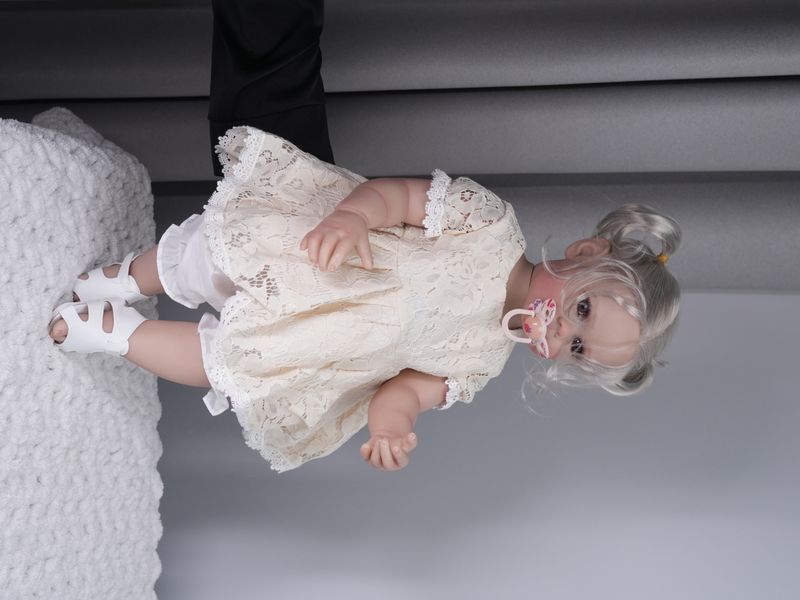 Ігрова лялька у стилі Reborn Baby Doll Maggi 55 см з силікон-вініловим тілом, одягом, підходить для купання (RB003) RB003 фото