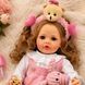 Игровая кукла в стиле Reborn Baby Doll Liana 55 см &ndash; виниловая девочка с кудрявыми светлыми волосами и аксессуарами; подходит для купания (RB099) RB099 фото 2
