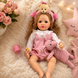Игровая кукла в стиле Reborn Baby Doll Liana 55 см &ndash; виниловая девочка с кудрявыми светлыми волосами и аксессуарами; подходит для купания (RB099) RB099 фото 3