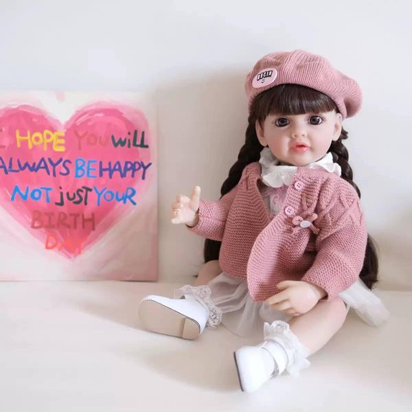 Ігрова лялька у стилі Reborn Baby Doll Mila 55 см, вінілова дівчинка у рожевому образі з беретом, з волоссям, можна купати (RB053) RB053 фото
