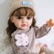 Ігрова лялька у стилі Reborn Liora Cozy 55 см &mdash; вінілова дівчинка з волоссям та аксесуарами, можна купати (RB054) RB054 фото 2