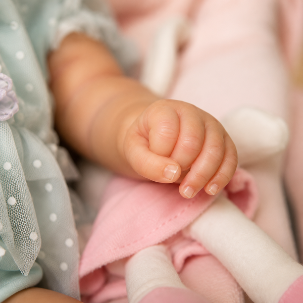 Ігрова лялька у стилі Reborn Baby Doll Millie 50 см &ndash; вініл-силіконова з одягом та аксесуарами (RB082). RB082 фото