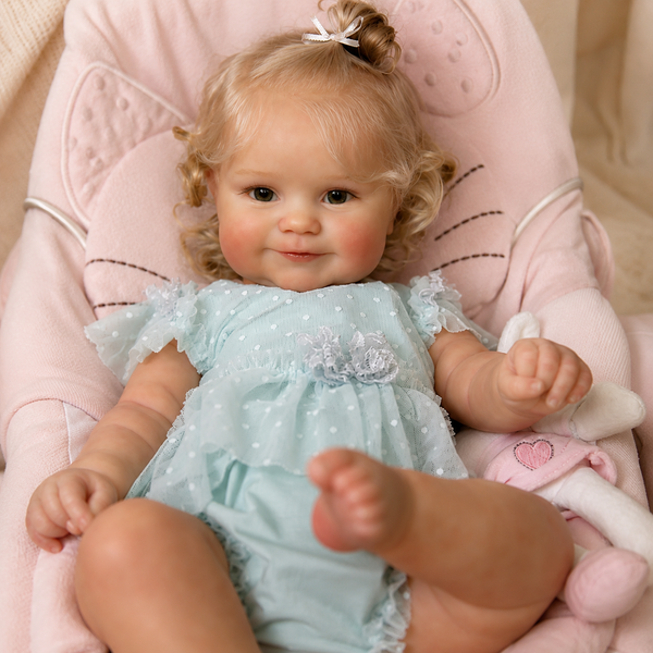 Ігрова лялька у стилі Reborn Baby Doll Millie 50 см &ndash; вініл-силіконова з одягом та аксесуарами (RB082). RB082 фото