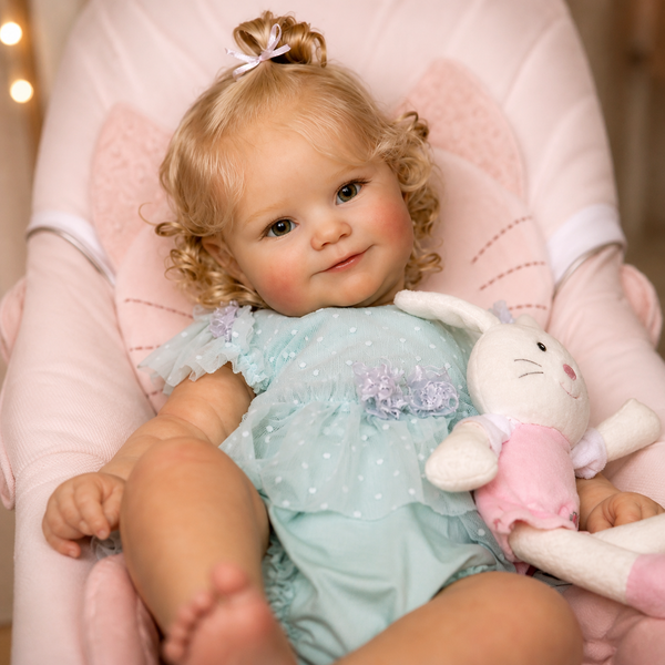 Ігрова лялька у стилі Reborn Baby Doll Millie 50 см &ndash; вініл-силіконова з одягом та аксесуарами (RB082). RB082 фото