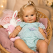 Ігрова лялька у стилі Reborn Baby Doll Millie 50 см &ndash; вініл-силіконова з одягом та аксесуарами (RB082). RB082 фото 3
