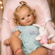 Ігрова лялька у стилі Reborn Baby Doll Millie 50 см &ndash; вініл-силіконова з одягом та аксесуарами (RB082). RB082 фото 4